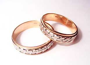 two gold-colored rings HD wallpaper
